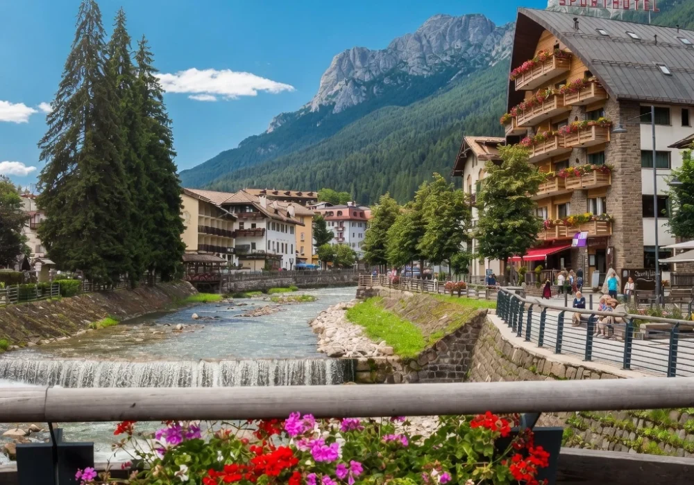 Vista panoramica di un fiume con un ponte fiorito in un paesaggio di montagna alpina. Vista panoramica di un fiume con un ponte fiorito in un paesaggio di montagna alpina.